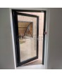 Puerta delantera pivotante de aluminio antracita totalmente acristalada