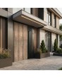 Puerta de entrada con bisagras de aluminio con textura de níquel dorado de metal fresado.