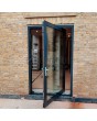 Puerta delantera pivotante de aluminio antracita totalmente acristalada
