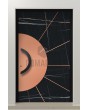 LIM Sahara: puerta abatible de aluminio revestida con cuarzo sinterizado Sahara Noir y lámina de cobre.