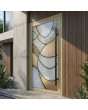 Puerta exterior batiente de aluminio con vidrieras color oro champán