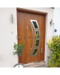 Puerta de entrada de acero en tono roble dorado con panel lateral abatible