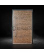 Puerta de entrada de aluminio oxidado recubierta de cuarzo sinterizado corten.