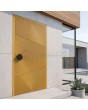 Puerta de entrada de aluminio amarilla con diseño fresado