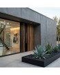 Puerta de entrada de aluminio con acabado de madera en HPL «Barrique Oak» 