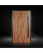 Puerta de entrada de aluminio negro con laminado de alta presión en nogal.