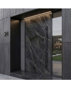 Puerta abatible de aluminio revestida con cuarzo sinterizado Calacatta Black.