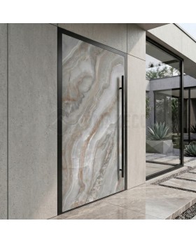 LIM Grigio: puerta abatible de aluminio recubierta de cuarzo sinterizado gris.